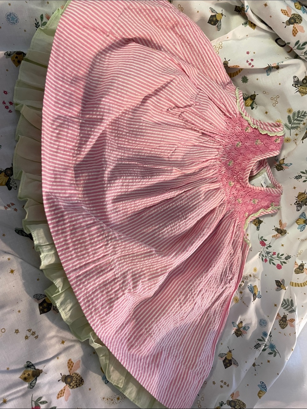 Smocked and lined dress. Ruffled panties. Buttoned back
